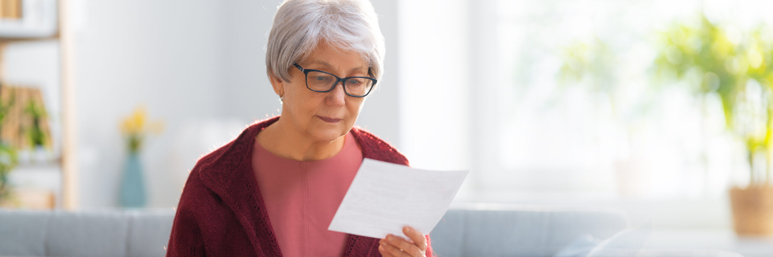 Senior looking at paperwork